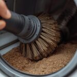 Cleaning dryer vent to prevent fire hazard