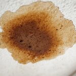 Water stain on ceiling indicating leak above