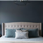 DIY painted moody accent wall behind a headboard