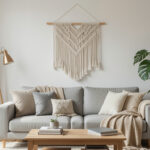Macrame wall hanging above a studio apartment sofa