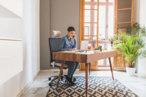 Modern home office with ergonomic furniture and natural lighting